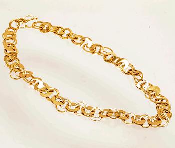 An 18K gold necklace by Cusi Italy.