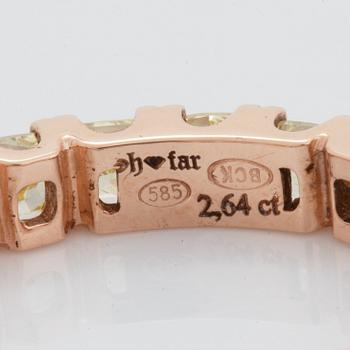 Cushion-cut yellow diamond eternity ring.