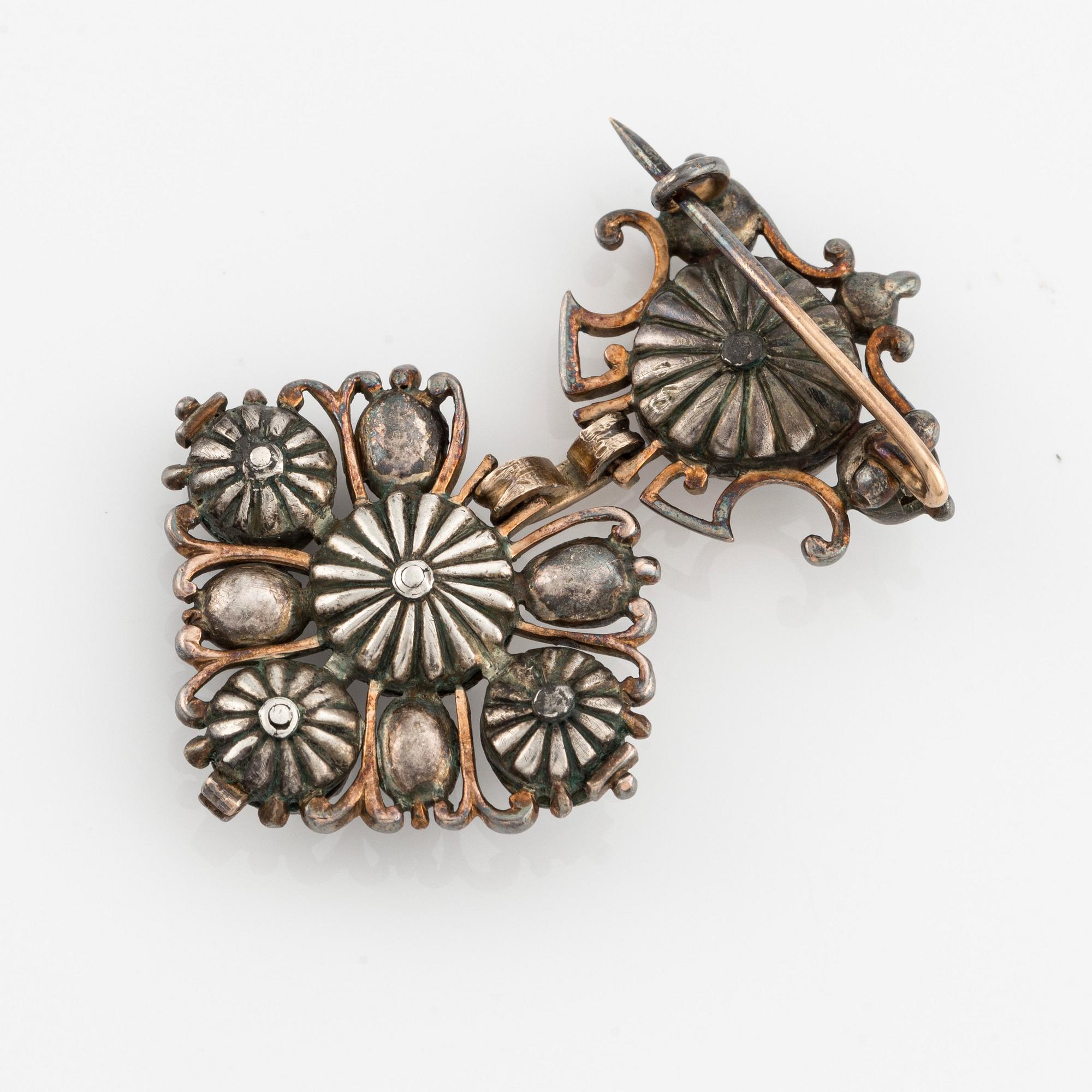 A  14K gold and silver brooch with rose-cut diamonds, 19th century.