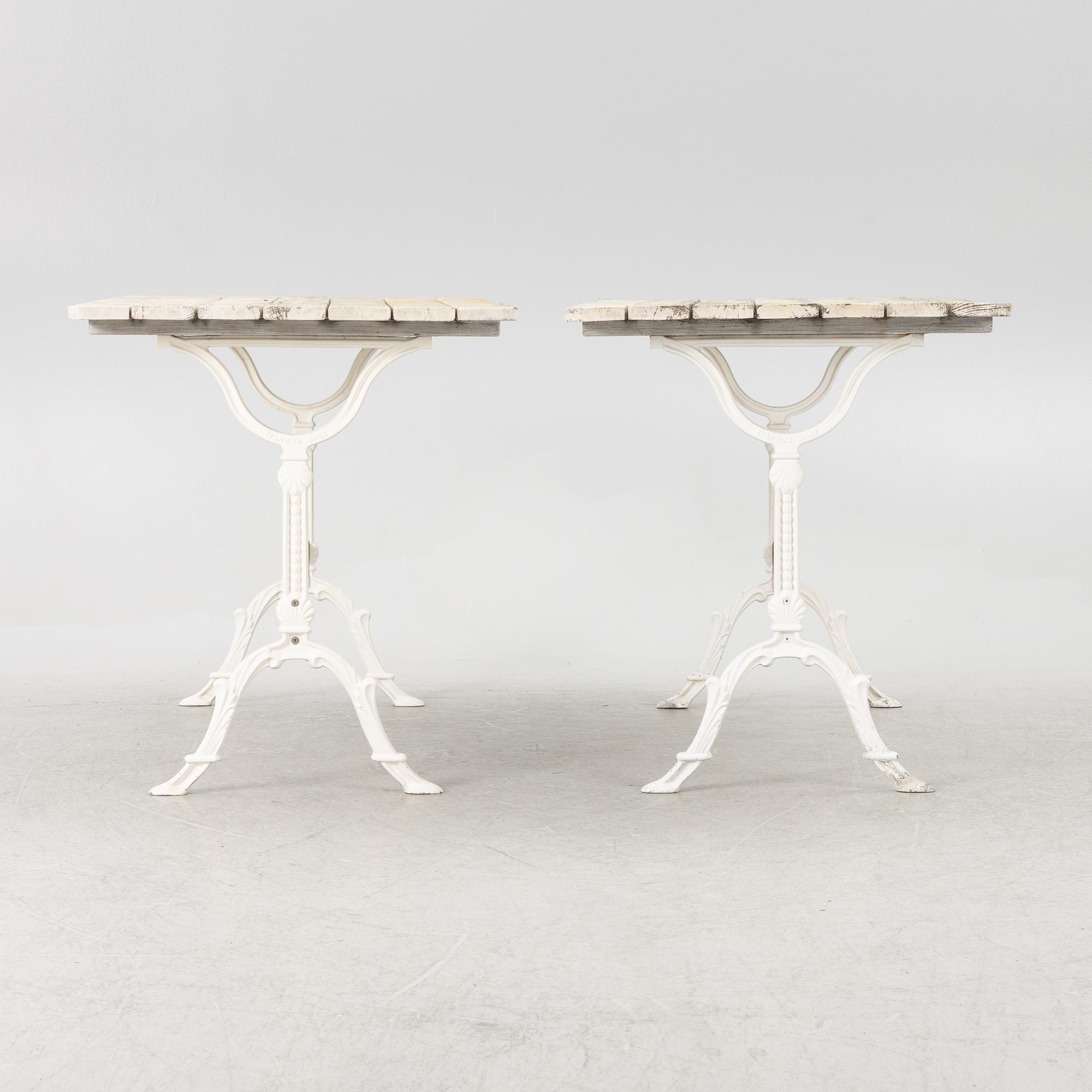 A set of seven garden chairs and two tables Byarums bruk, later part of the 20th century.