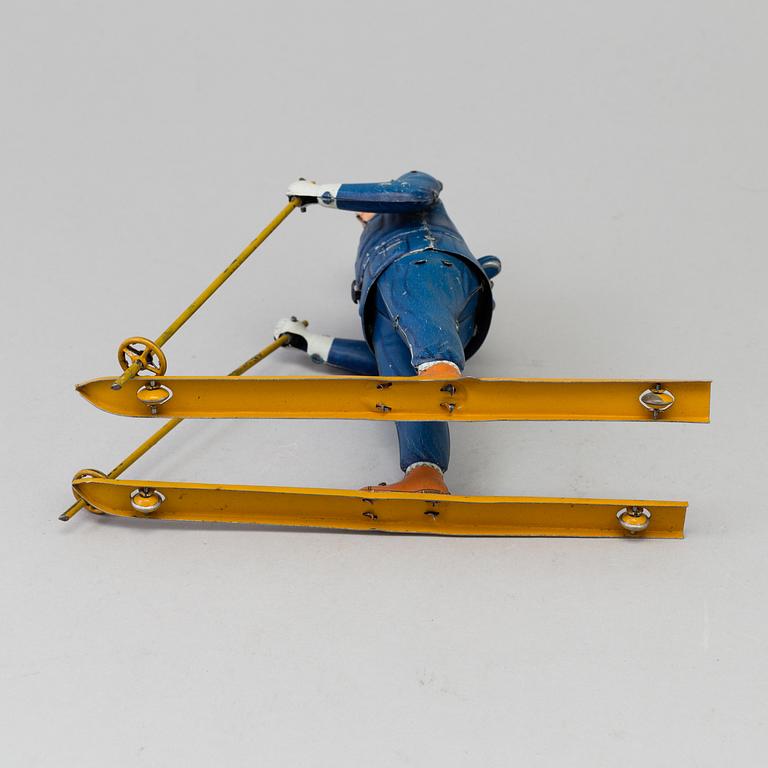 a Lehmann "Ski Rolf" tin toy, Germany 1930-1941.