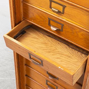 An oak file cabinet, first half of the 20th century.