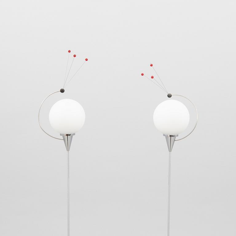 Floor lamps, a pair from Oligo Germany, 21st century.