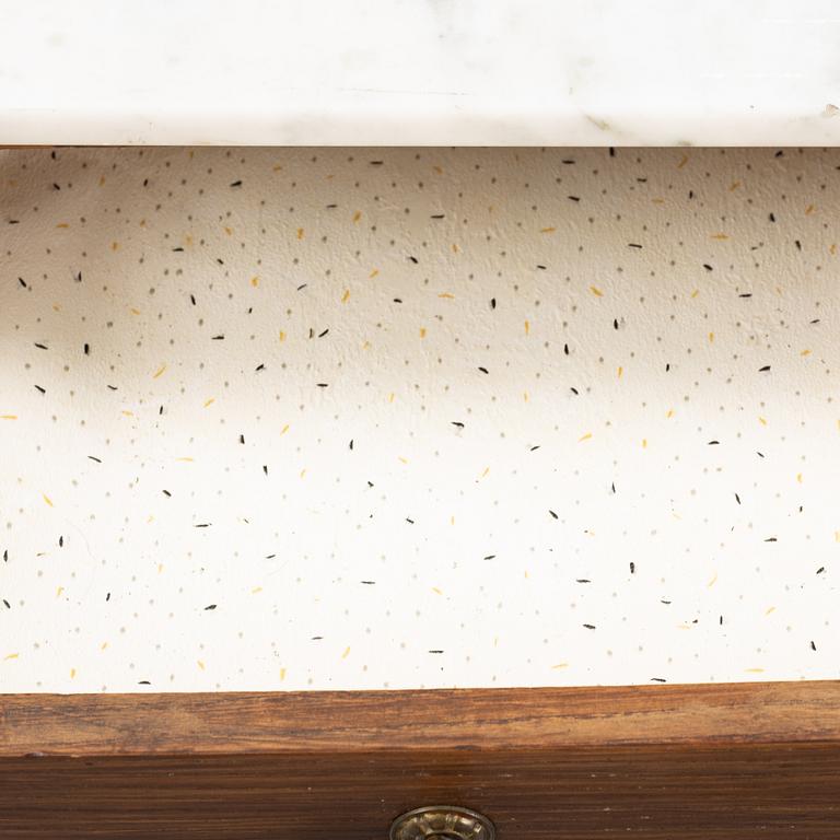A pair of early 20th Century bedside tables.