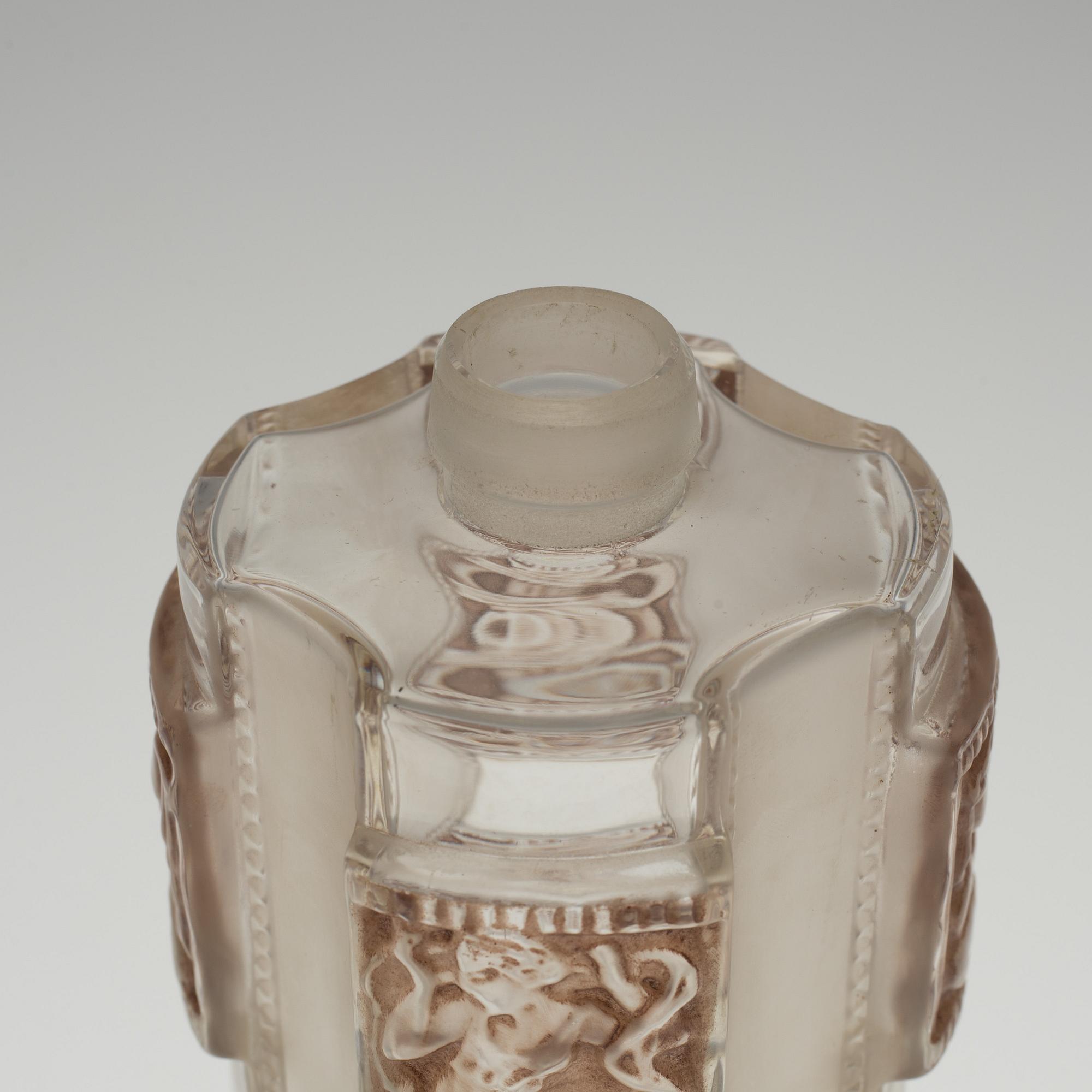 A René Lalique 'Hélène', flacon no 1, moulded glass bottle, France 1942-51.