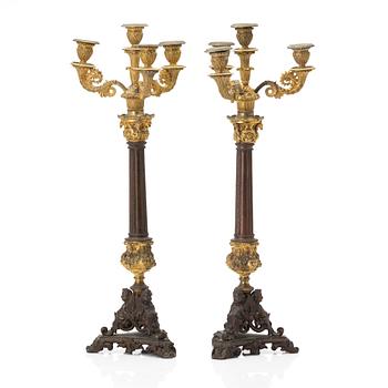A pair of late Empire candelabra, 19th century.