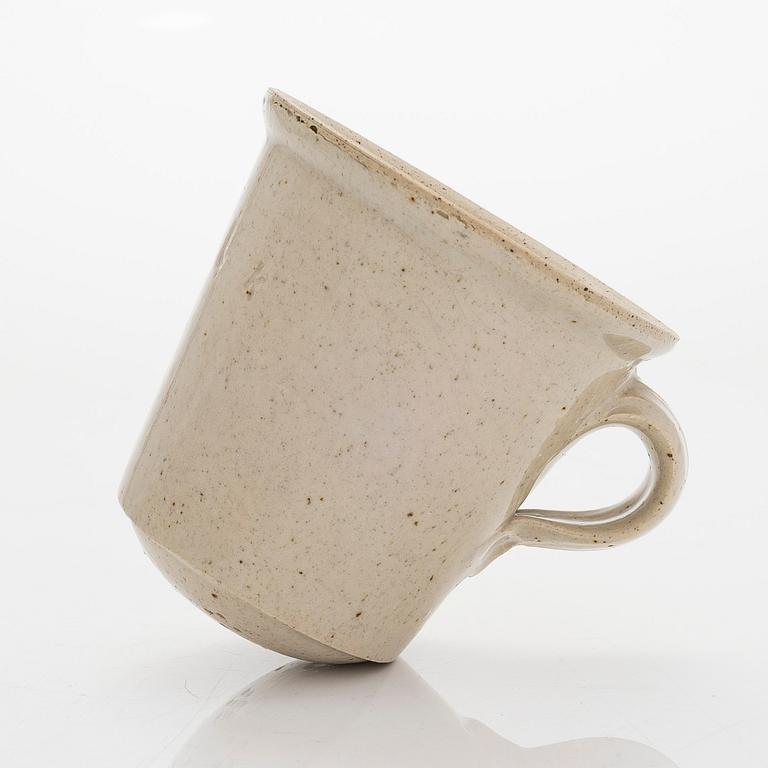 Kyllikki Salmenhaara, a stoneware tea strainer signed KS.