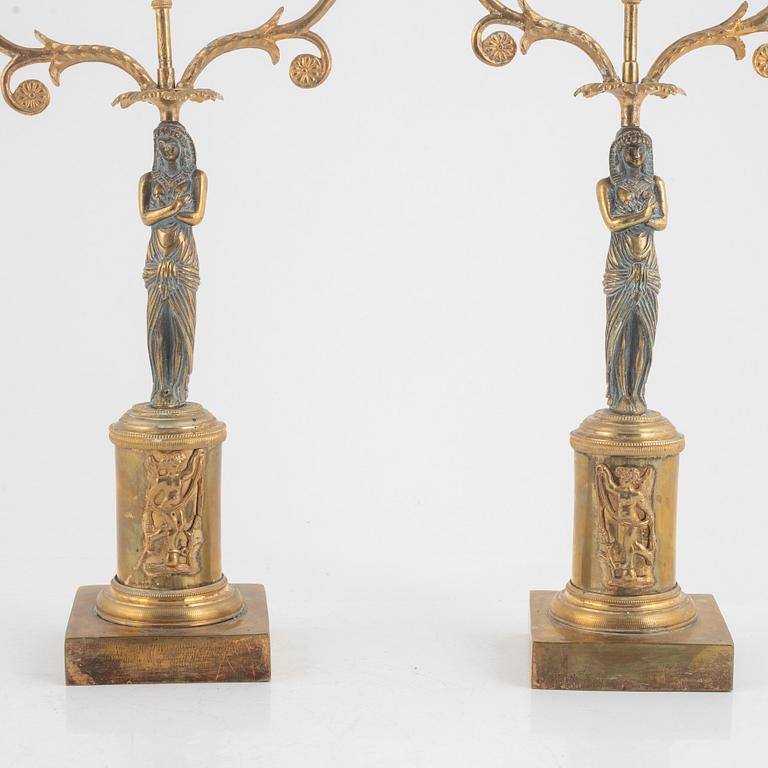 A pair of Empire style candelabra, around 1900.