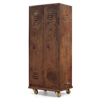 A 20th century patinated metal changing room cabinet.