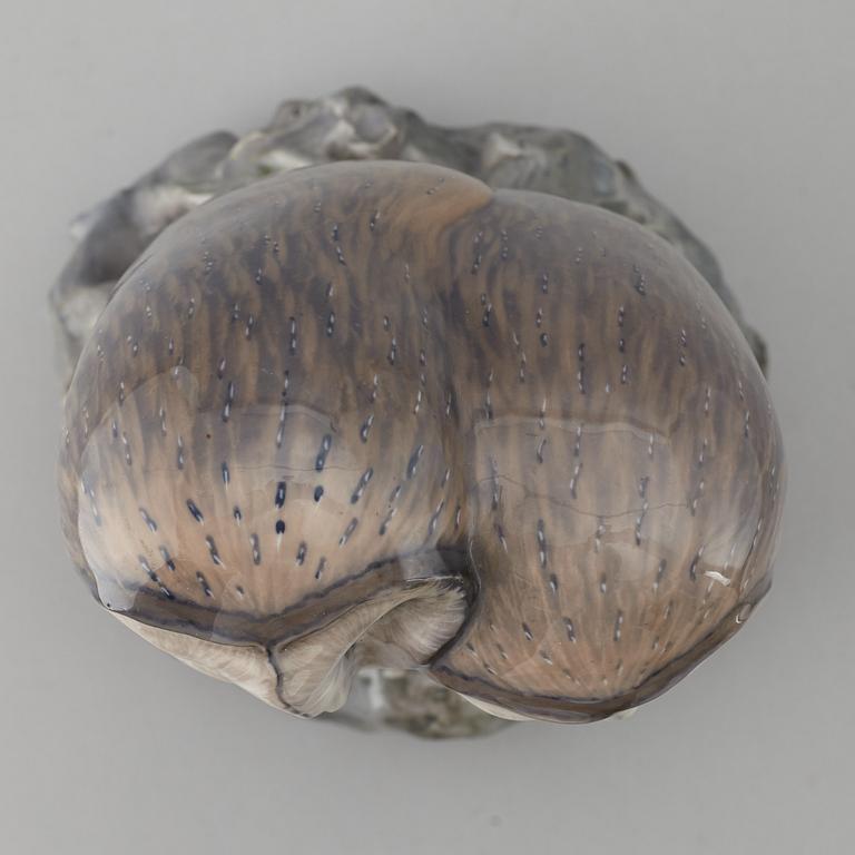 A Royal Copenhagen porcelain figure of two owls, Denmark, 20th Century.