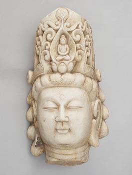 459. A white stone 20th century buddha head.