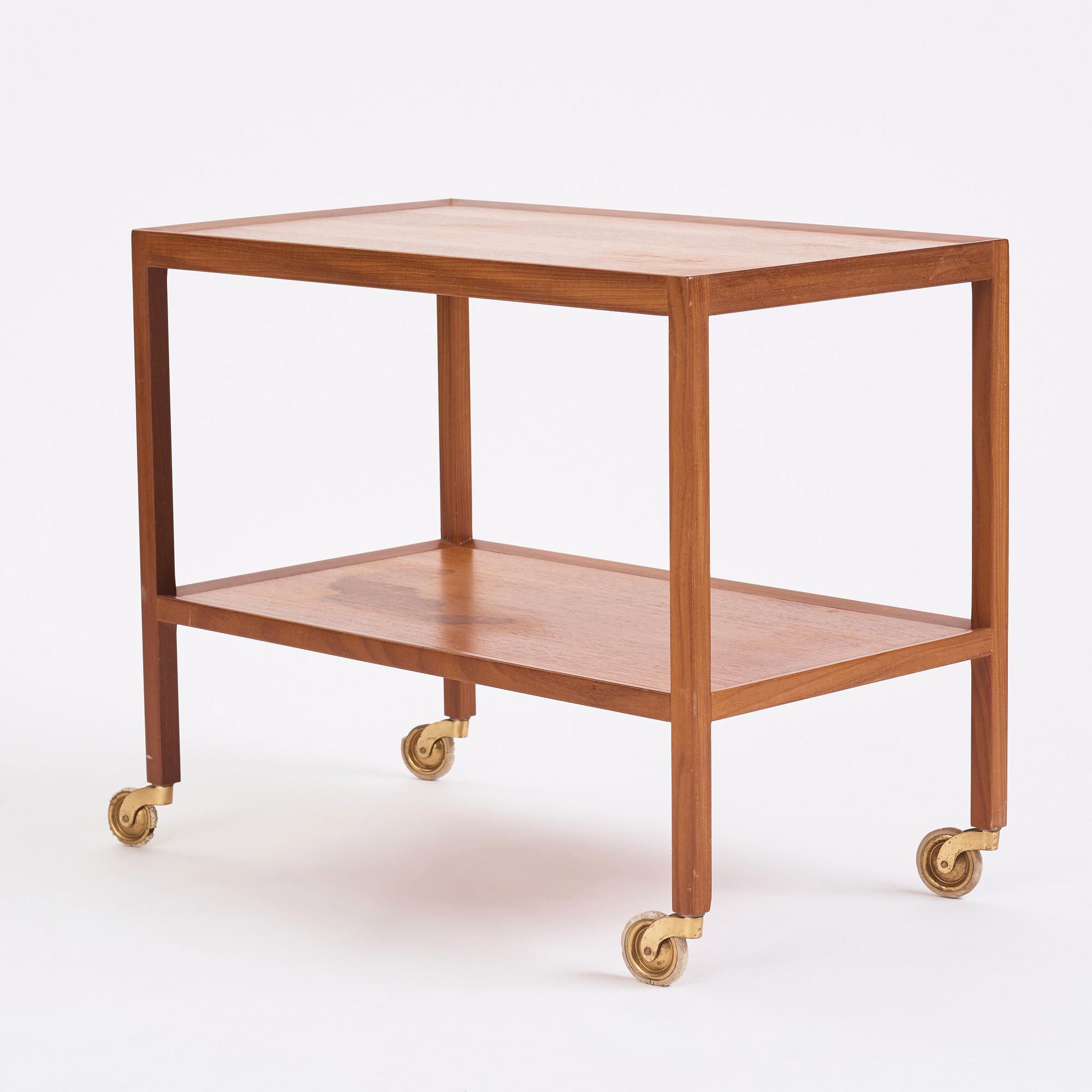 Nordiska Kompaniet, a sideboard with tables and a serving trolley, Sweden 1950s.