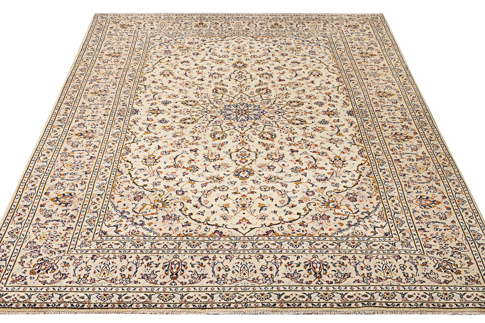 A Kashan carpet, c. 355 x 242 cm.