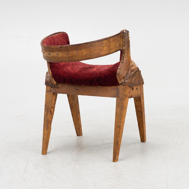 A side saddle, 18th/19th Century, mounted on legs.