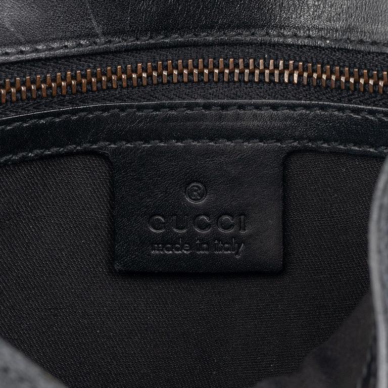 Gucci, väska och plånbok.