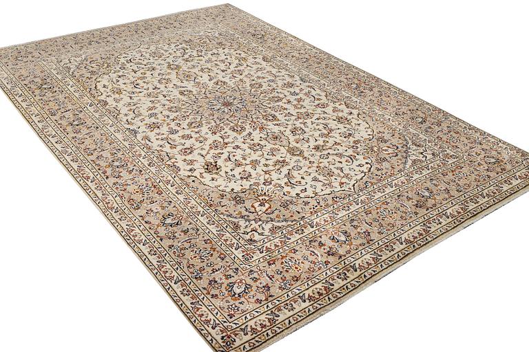 A Keshan carpet, c. 355 x 240 cm.