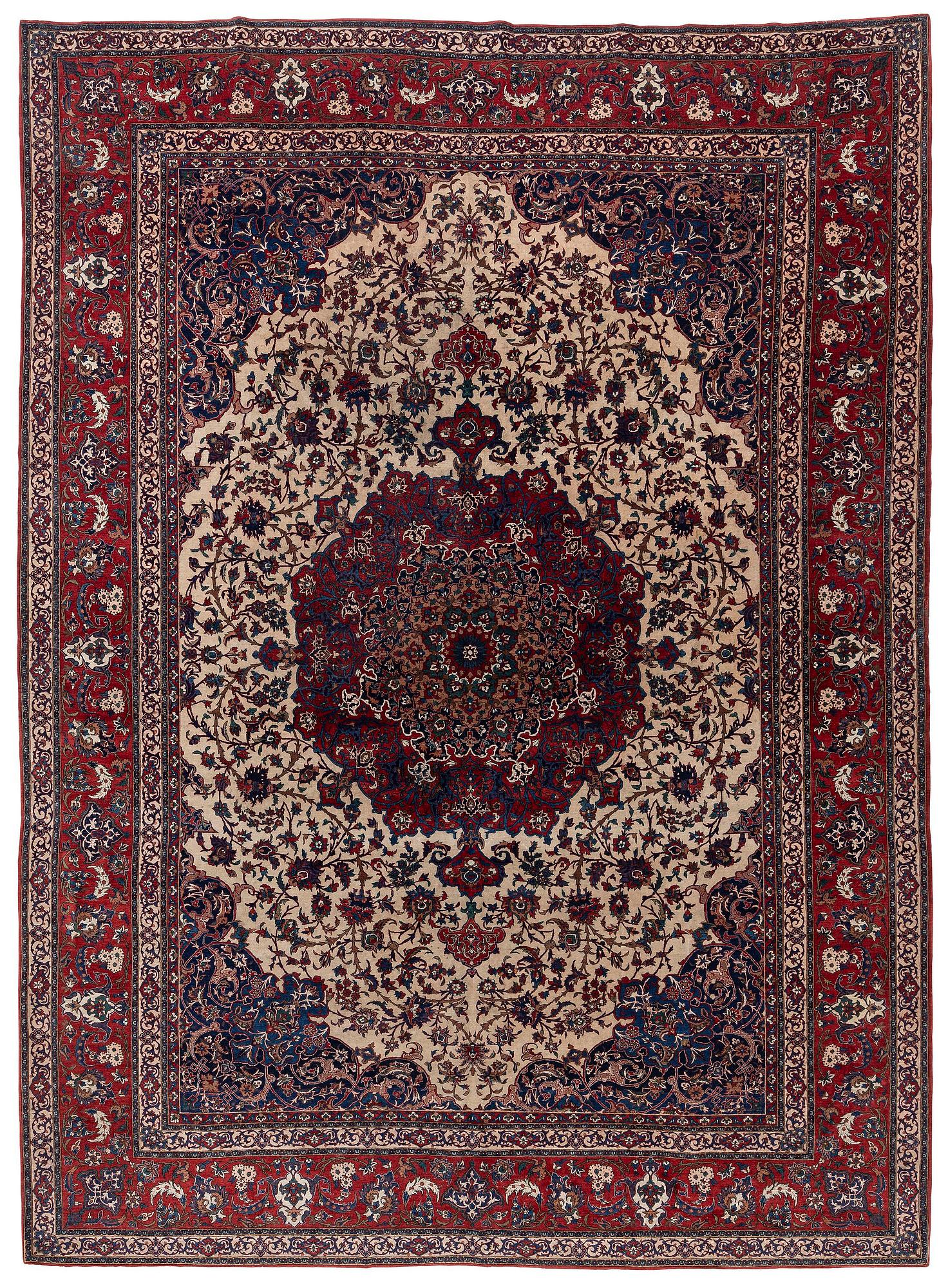A semi-antique Isfahan carpet, Central Iran, c. 432 x 319 cm.