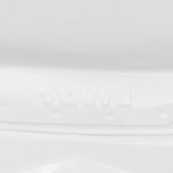 A set of four Tolix chairs.