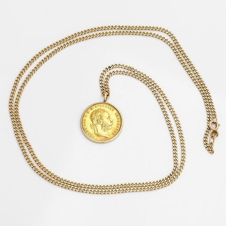 A gold coin pendant, Frans Josef I, Austria-Hungary, 1915. with a 14K gold chain.