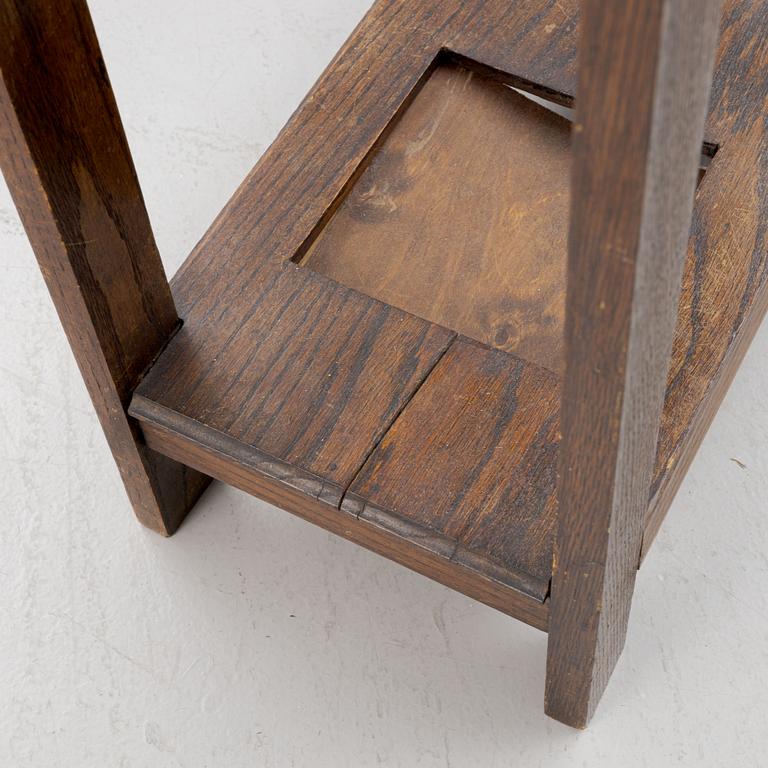 An oak coat hanger and umbrella stand, Early 20th century.