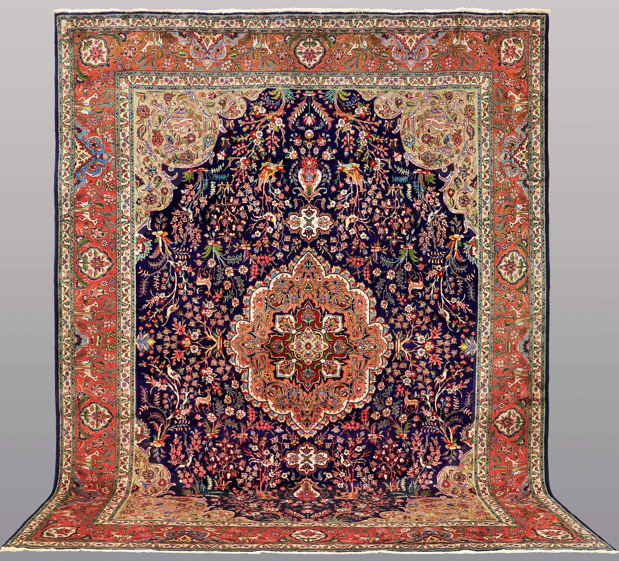 A CARPET, Figural Tabriz, ca 407 x 304 cm.