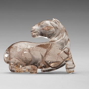 507. A quartz carving of a reclining horse, China.