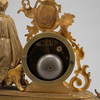 A Louis XVI-style ormolu and parcel gilt mantel clock, mid 19th Century.