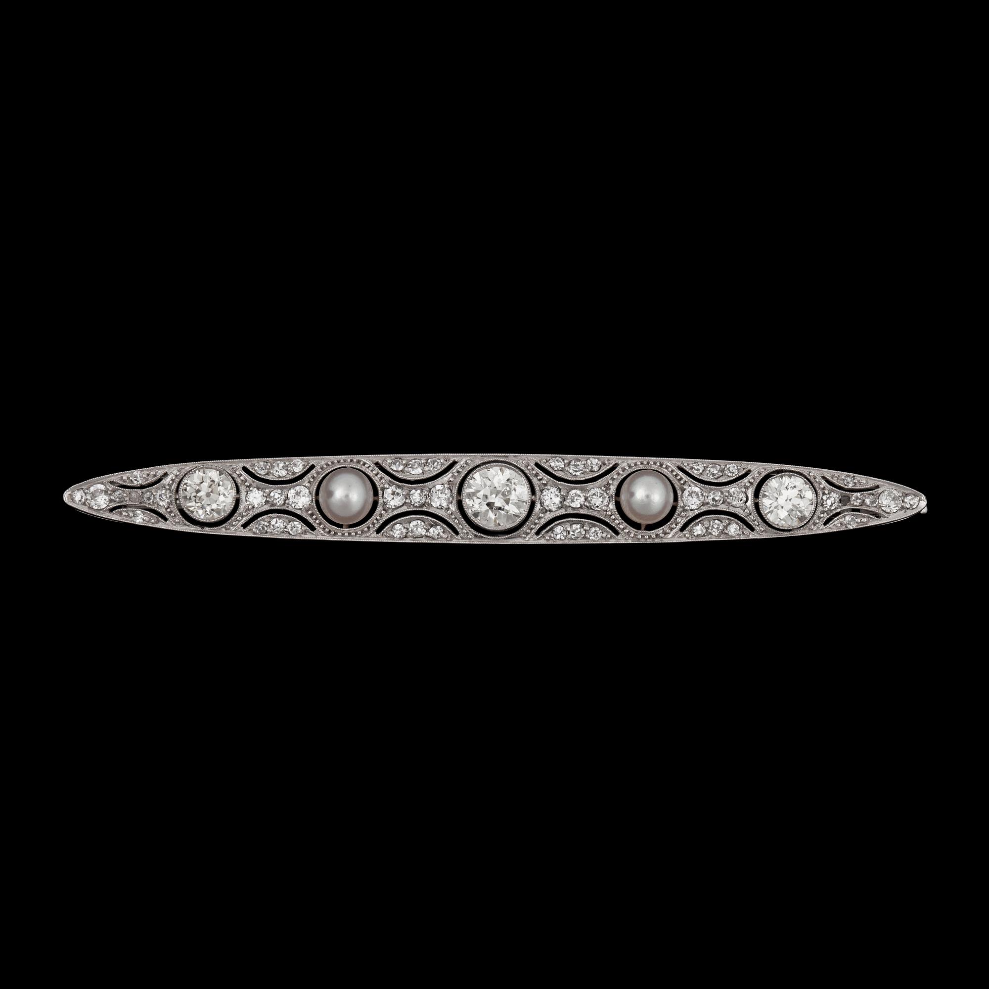 A pearl and old-cut diamond brooch.