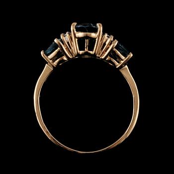 RING, 14k guld med 3 fasettslipade turmaliner samt 6 briljantslipade diamanter. Vikt 3 g.