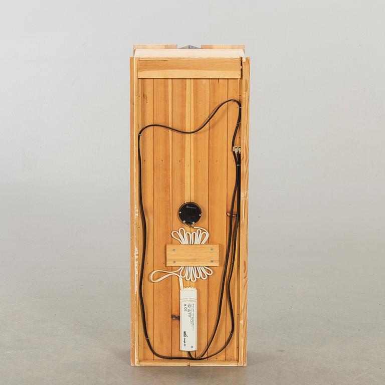 A wall cabinet "Blå ljus" design Olof Pira.