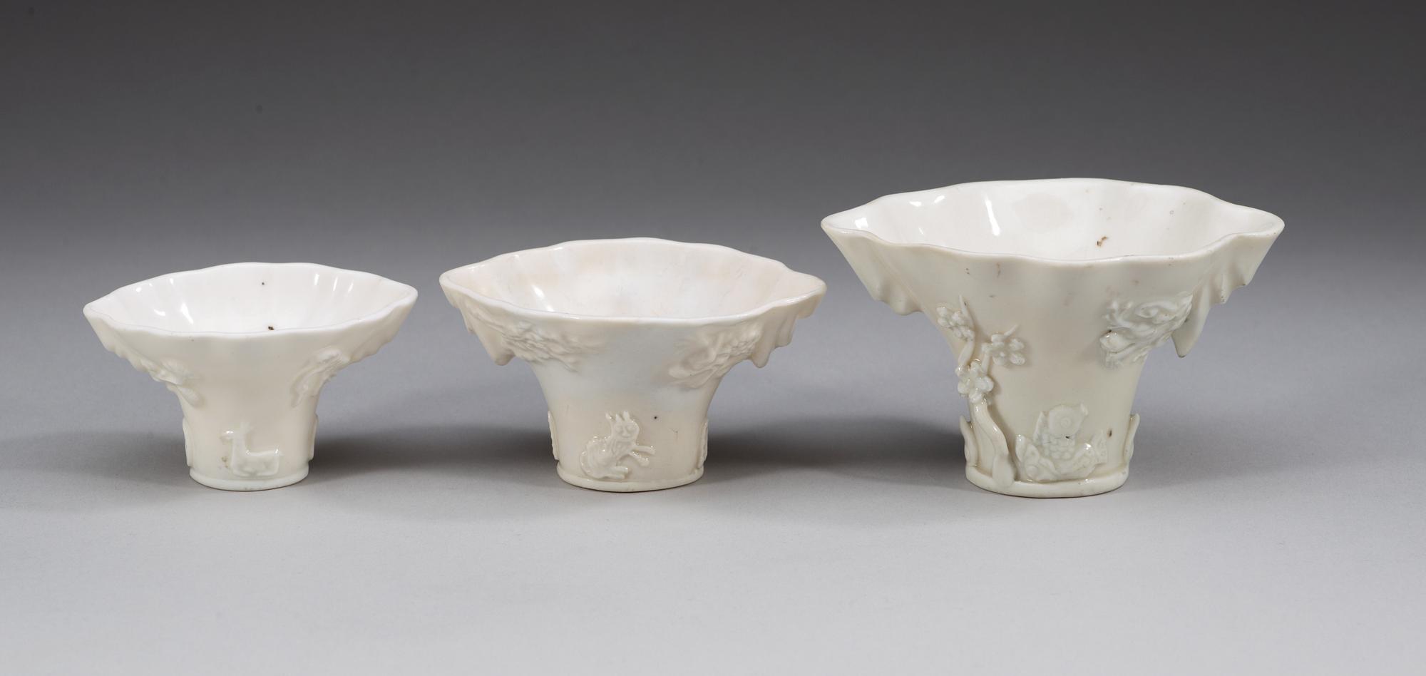 A set of three blanc de chine rhinoserous cups, Qing dynasty.