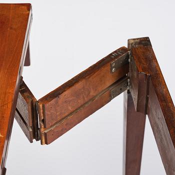 A Gustavian 'concertina action' mahogany games table by Georg Haupt (master in Stockholm 1770-84).