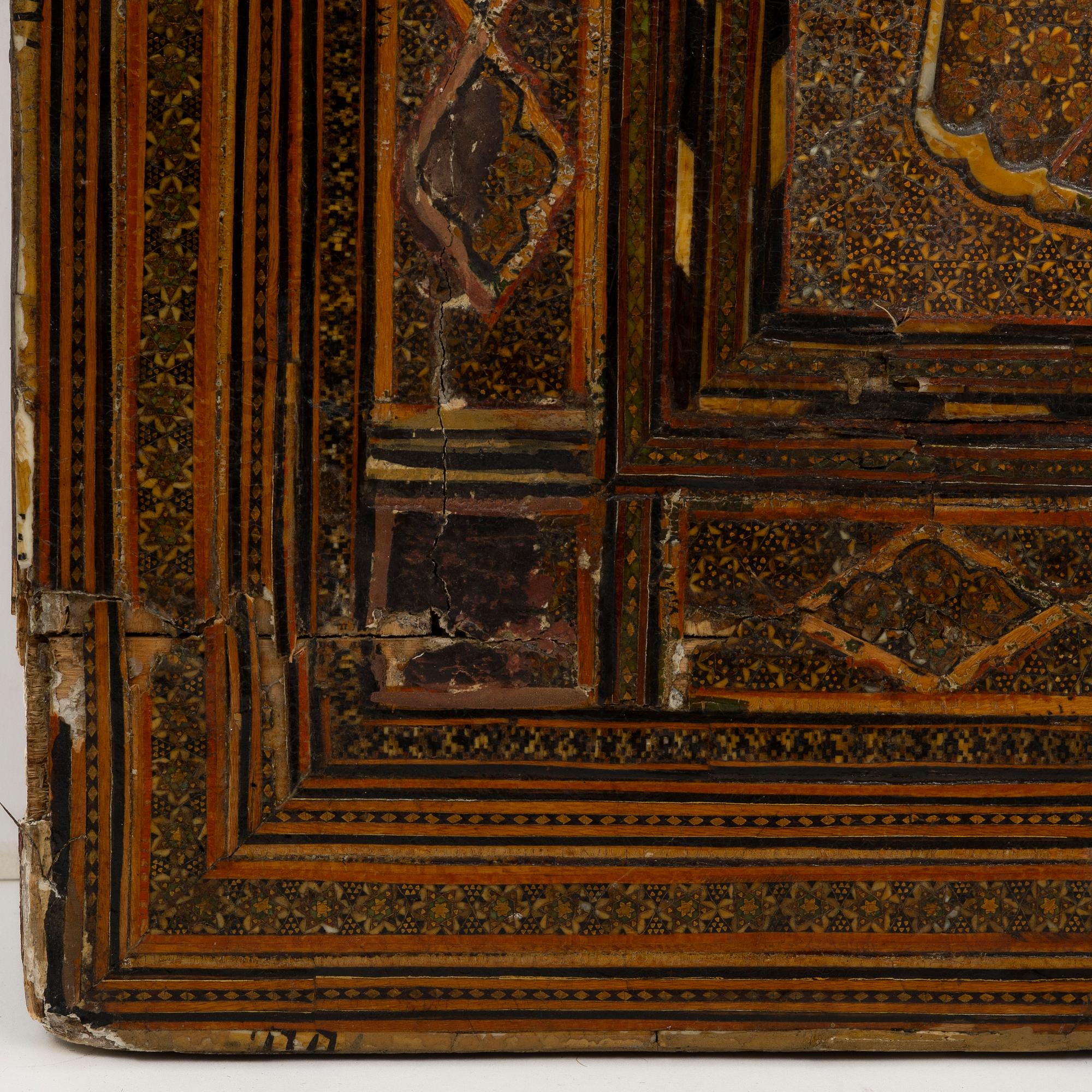 A Qajar Khatamkari laque mirror, circa 1900.