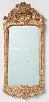 A Swedish gitlwood rococo mirror, Stockholm, later part 18th century.
