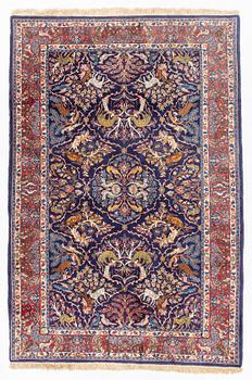 Rug, likely Tabriz, signed, approximately 212 x 145 cm.