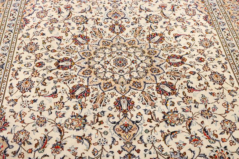 A Keshan carpet, c. 348 x 240 cm.
