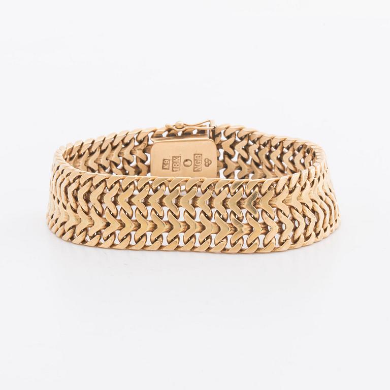 GULDARMBAND, fiskbenslänk, 18K guld, 62,2 g, Nils-Olofs Guldsmedja Stockholm 1963.