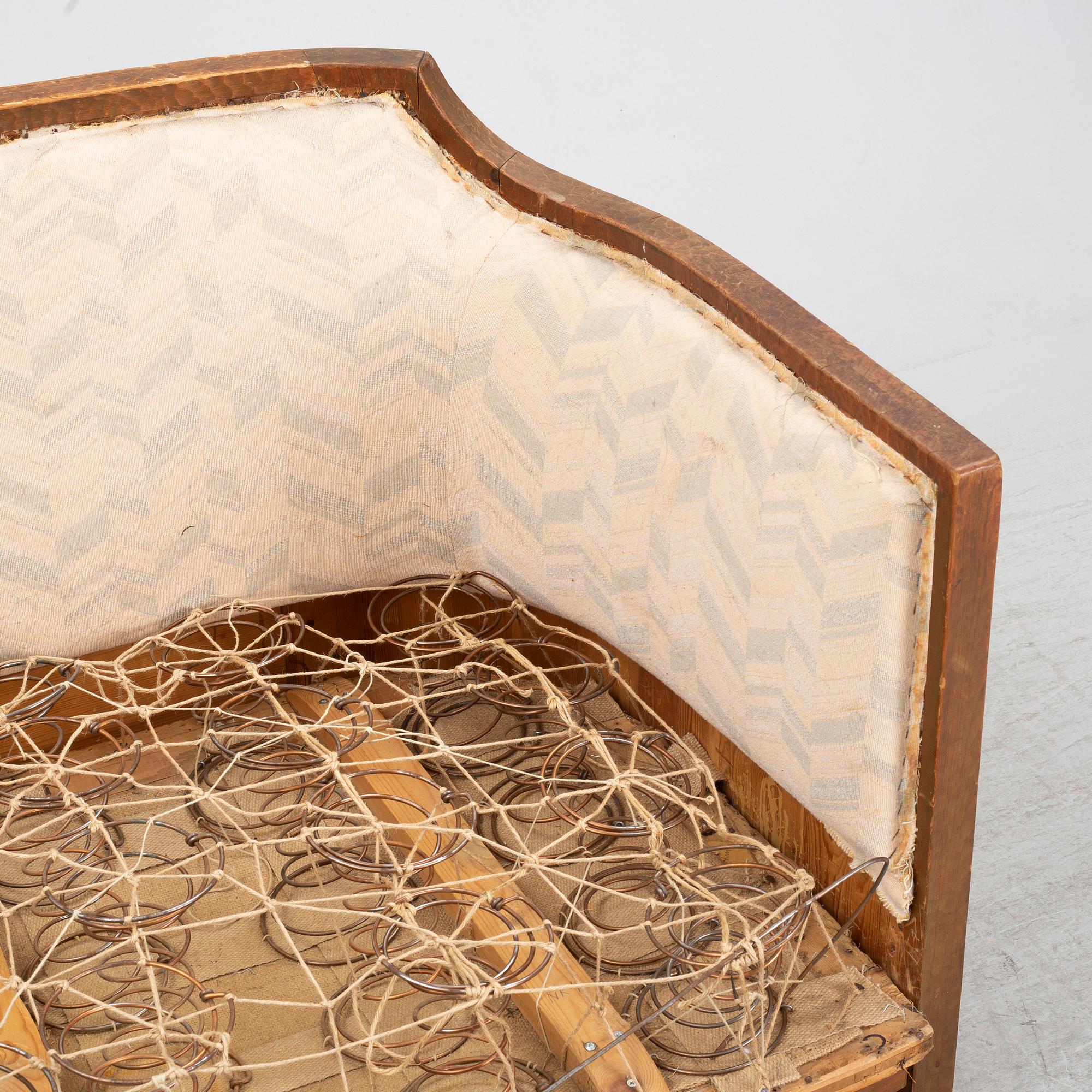Otto Wretling, attributed to, an Art Nouveau pine sofa, Sweden early 20thC.
