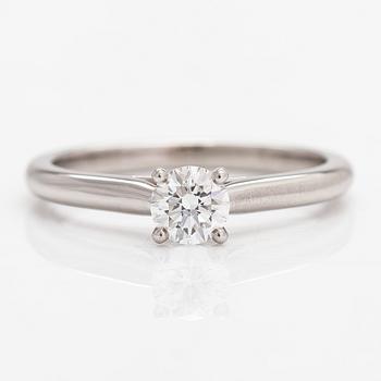 Cartier, a platinum ring with a diamond ca. 0.53 ct. Marked Cartier, FIK691 58. With certificate.