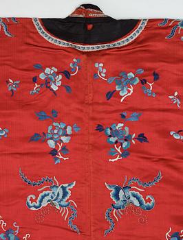 An embroidered silk robe, early 20th Century.