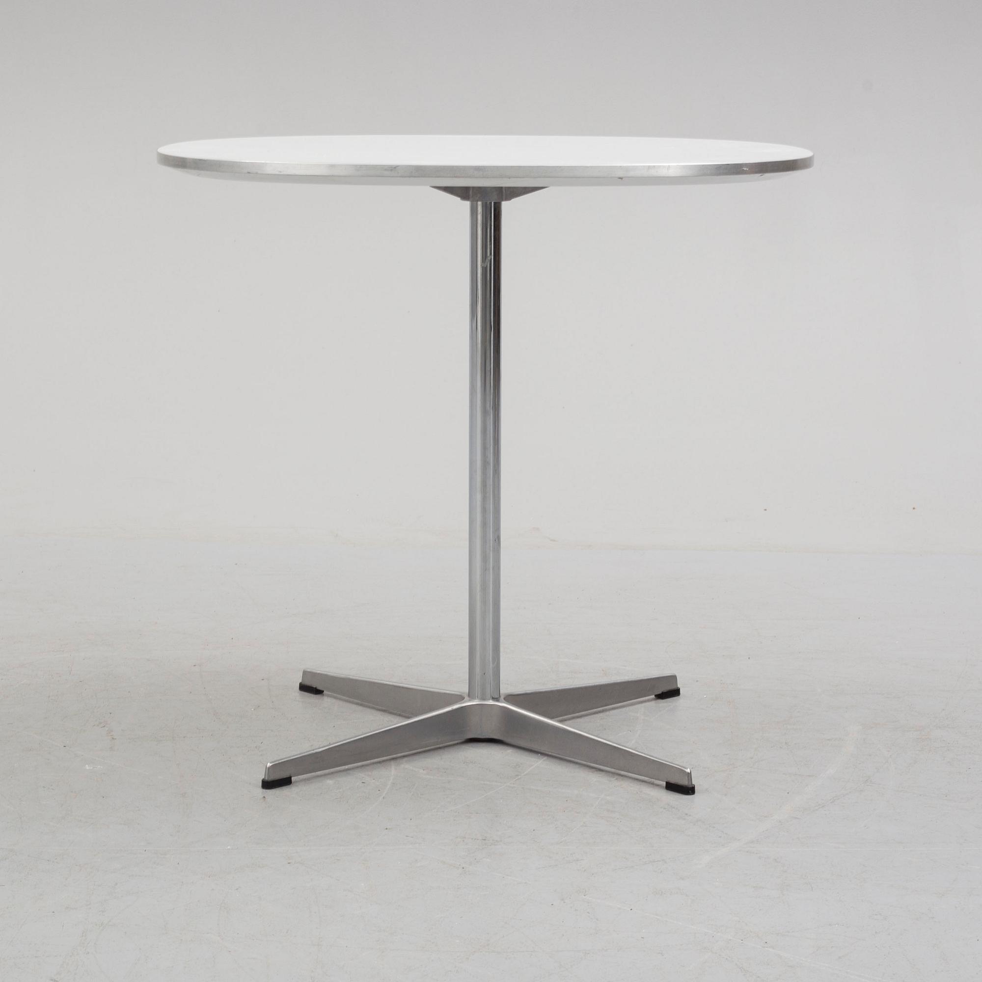 A 'Supercirkel' table by Bruno Mathsson & Piet Hein, Denmark, 1978.