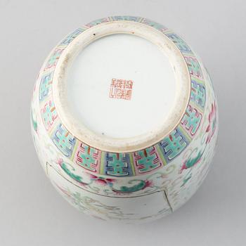 A chinese famille rose lotus jar with cover, 20th Century.