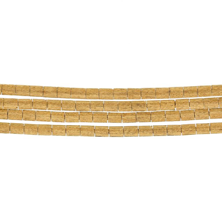 ARMBAND, guld 18K, sju små safirer, Italien 1900-talets andra hälft. Vikt ca 31 gram.