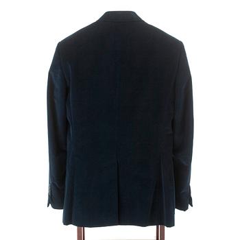 YVES SAINT LAURENT, a blue velvet jacket.