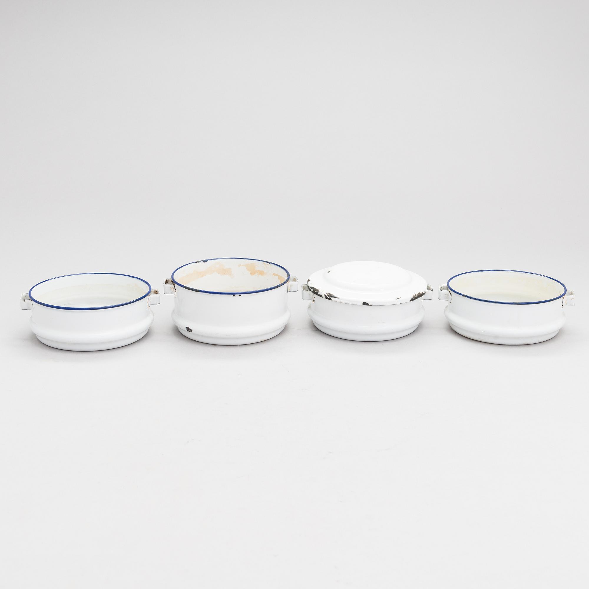A set of 7 enamelled metal serving dishes. Kockums emaljverk and Finel.