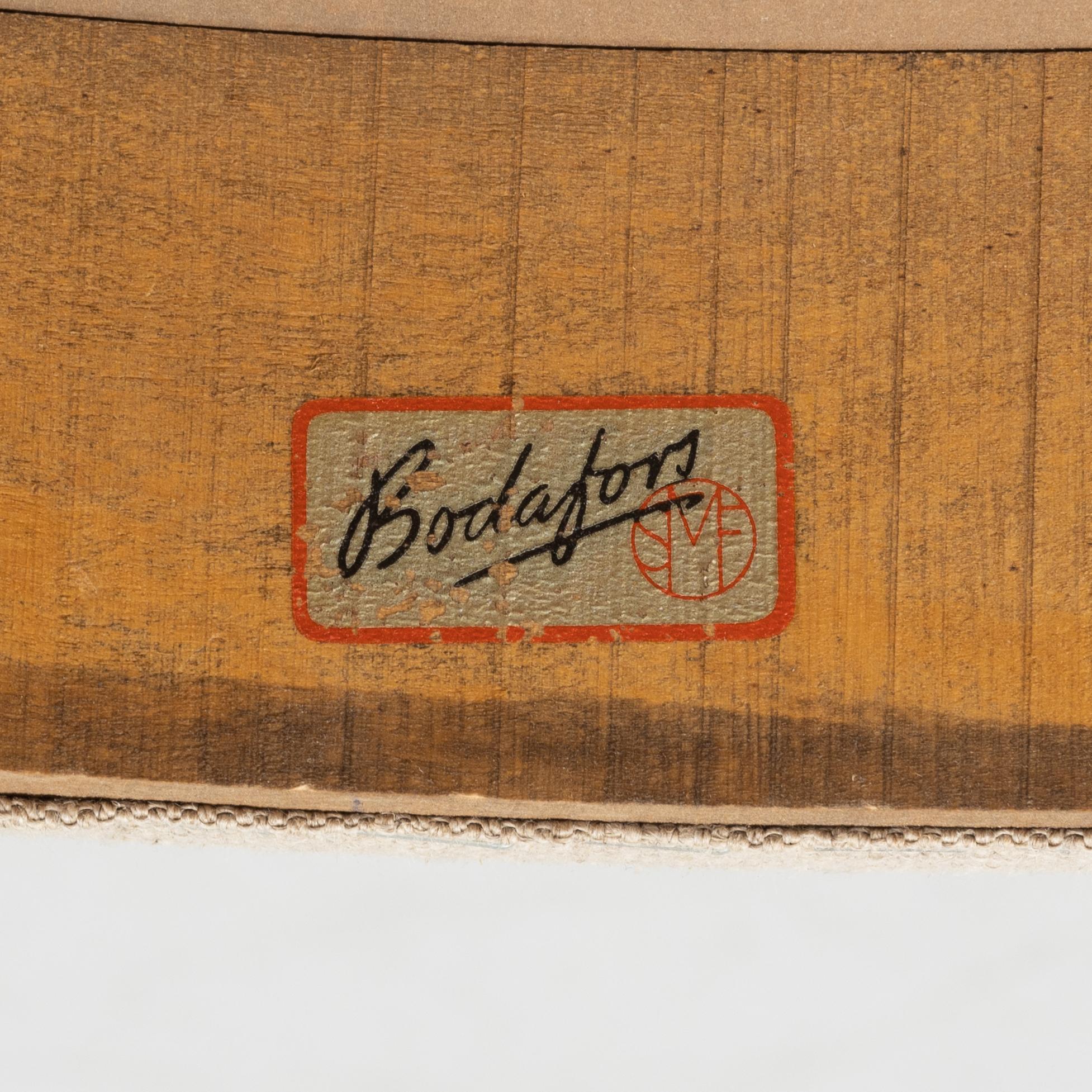 Bertil Fridhagen, a model 'Eugen' dining table, and four chairs from Bodafors, Sweden, 1950's/60's.