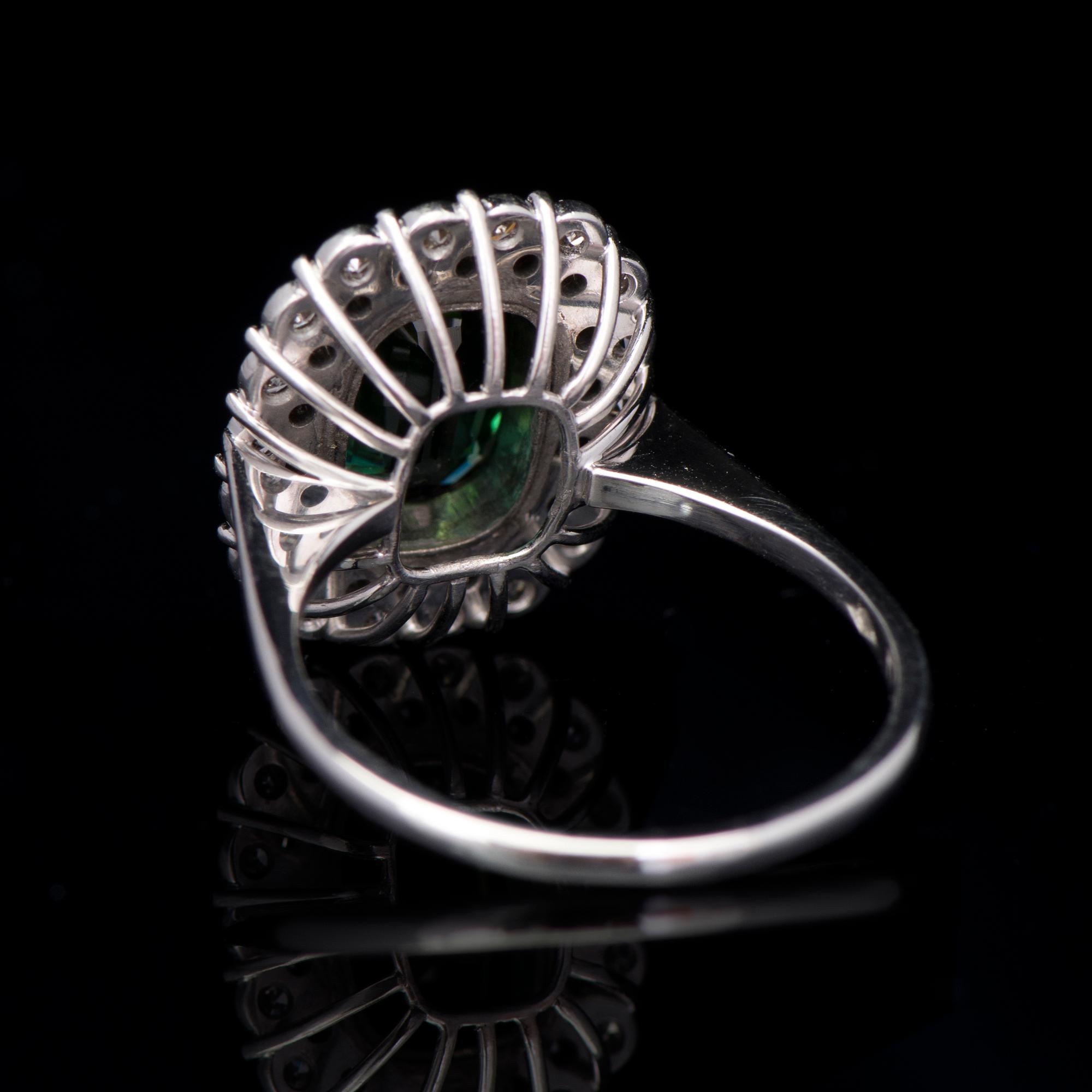 SORMUS, viistehiottu turmaliini, 8/8-hiotut timantit. A. Tillander, Helsinki 1975.