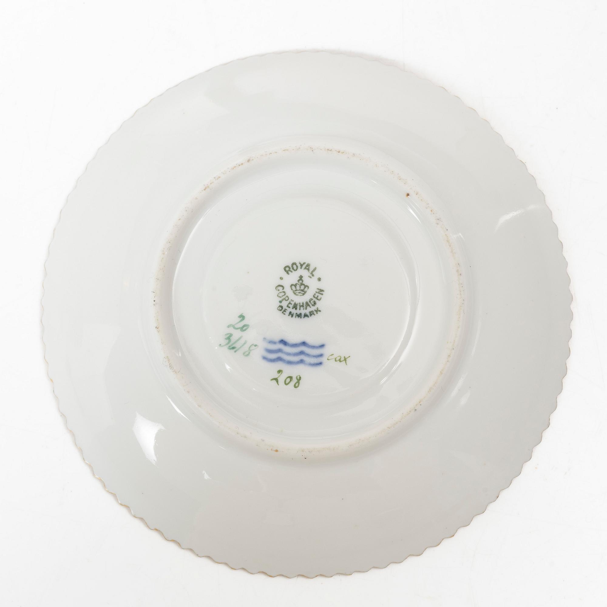 A Royal Copenhagen 'Flora Danica' coffee cup with stand, Denmark, 20th Century.
