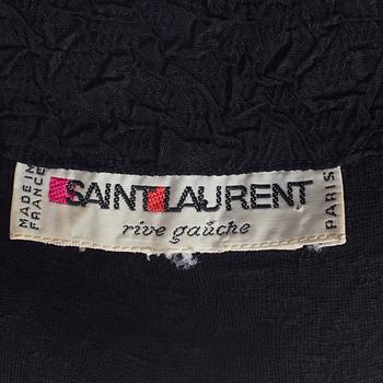 A two piece suit from Saint Laurent rive gauche.