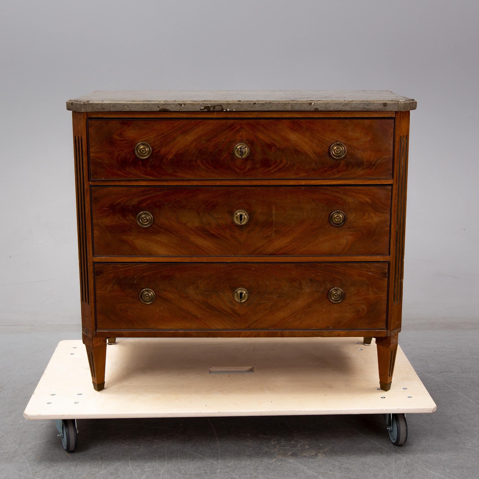 A late 19th century gustavian style chest of drawers.